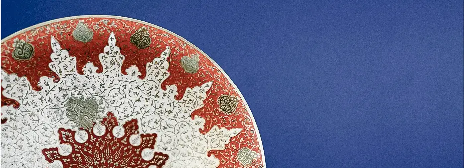 Close up of a plate on a blue table